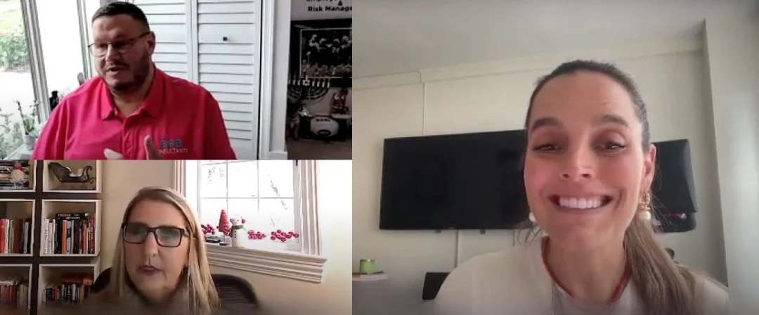 Video call screenshot of a man in a red polo shirt speaking, with a woman in glasses and a third woman smiling in separate panels.